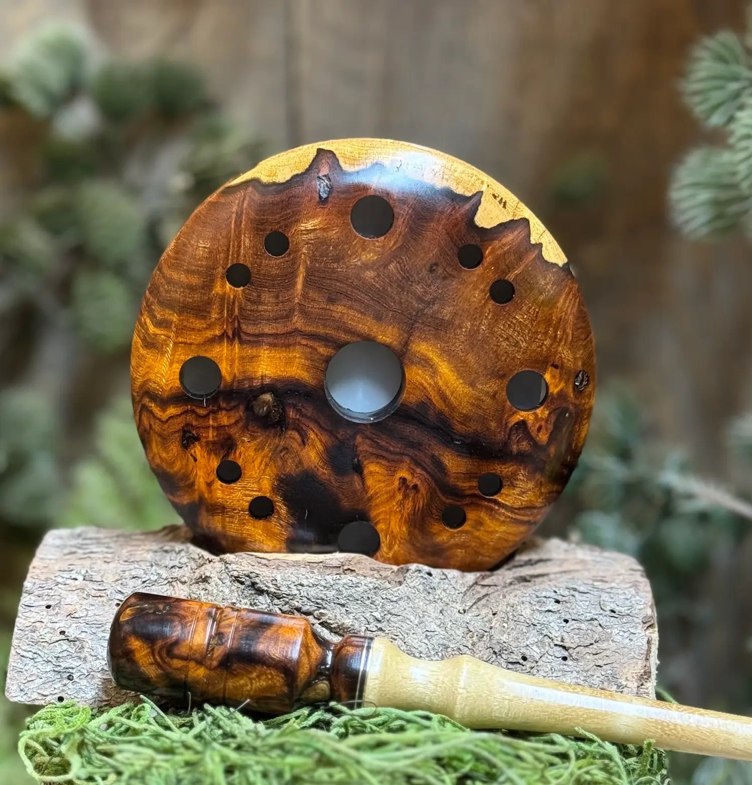 Desert Ironwood Turkey call with sapwood inclusion next to a custom matching striker head with brass inlays and milky toned black locust wood stem.