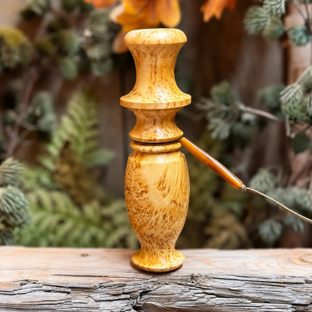 golden tone Yellow Cedar Burl compact grunt for blacktail or whitetail with buffalo horn bead on lanyard