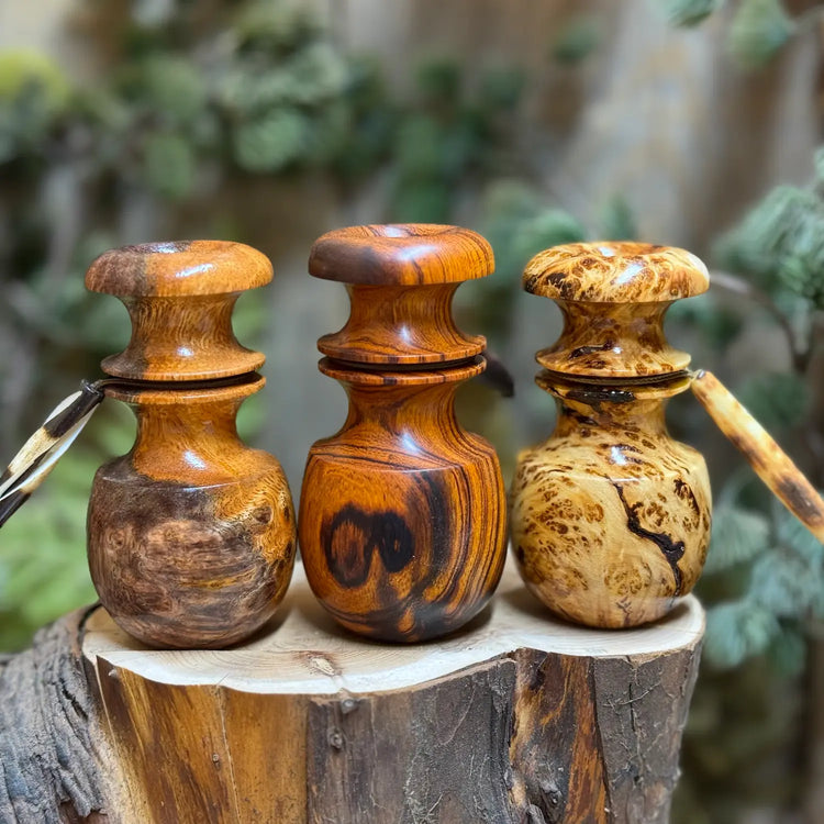 Three Blacktail bleats side by side: Weru Burl wood, Ironwood , and Yellow Cedar Burl Wood 