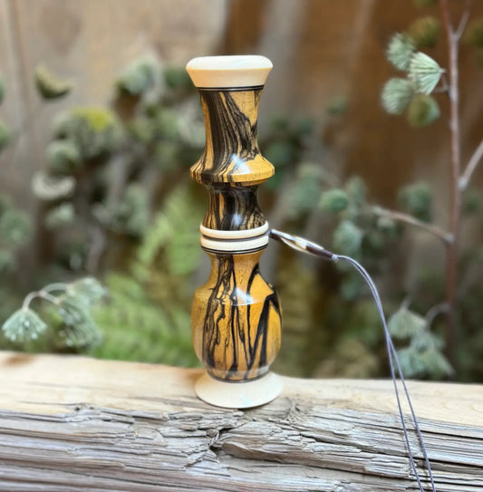 Black and white ebony wood deer grunt with thread-together design and lanyard groove using brass inlays and faux ivory accents
