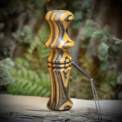 custom crafted black and white ebony wood owl hooter with compact design and custom lanyard