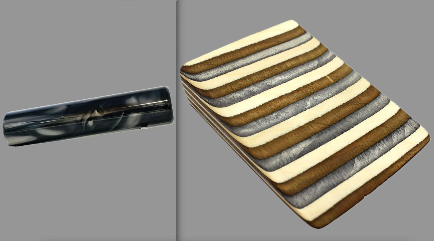 swatch of swirling black and grey tone acrylic rod next to Buckskin laminate wood pattern of alternating grey, copper, and creme tones separated by black dividing lines