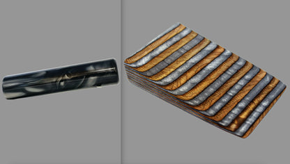 swatch of swirling black and grey tone acrylic rod next to Coffee laminate wood pattern of alternating grey, copper, and black tones