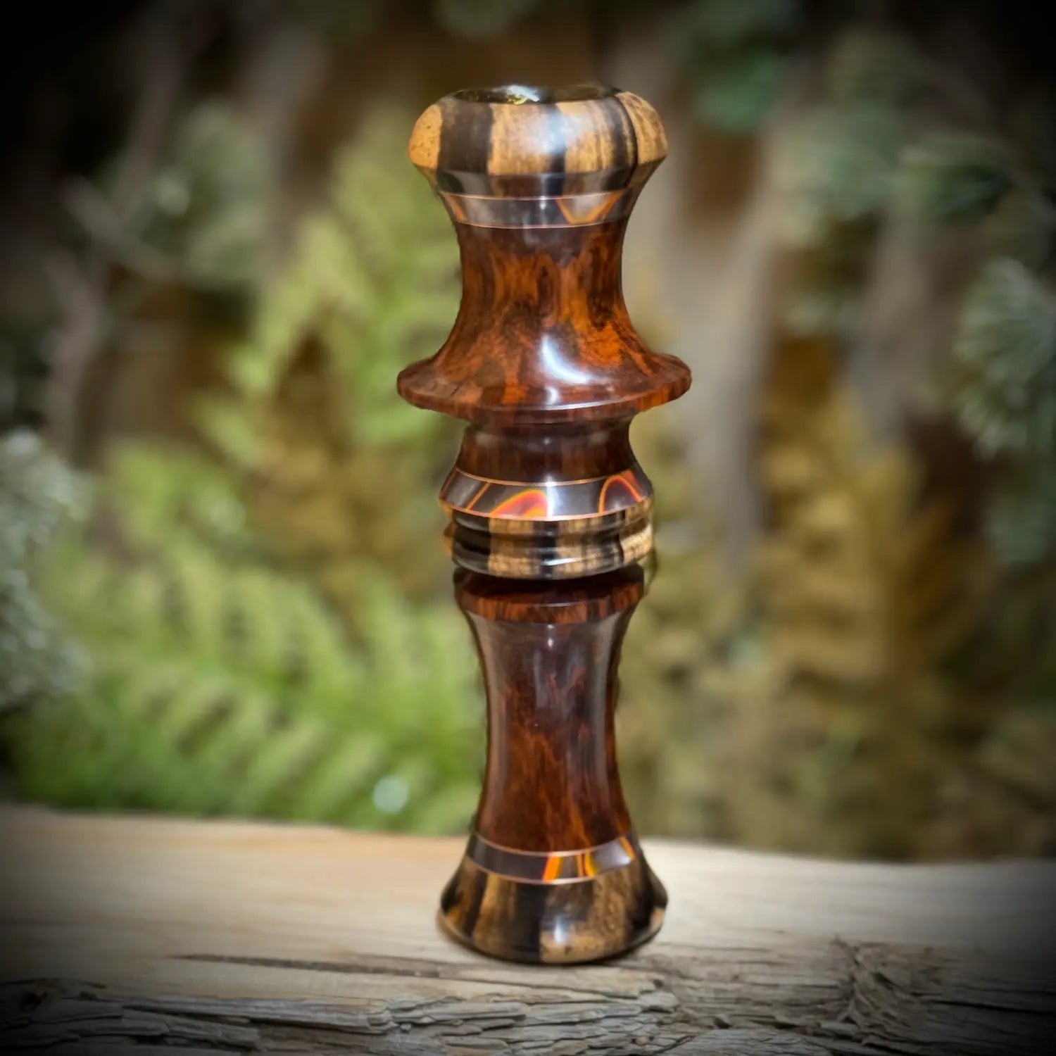 Custom duck call made with high grade snakewood and black and white ebony caps brass inlays and acrylic flame details