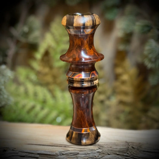 Custom duck call made with high grade snakewood and black and white ebony caps brass inlays and acrylic flame details
