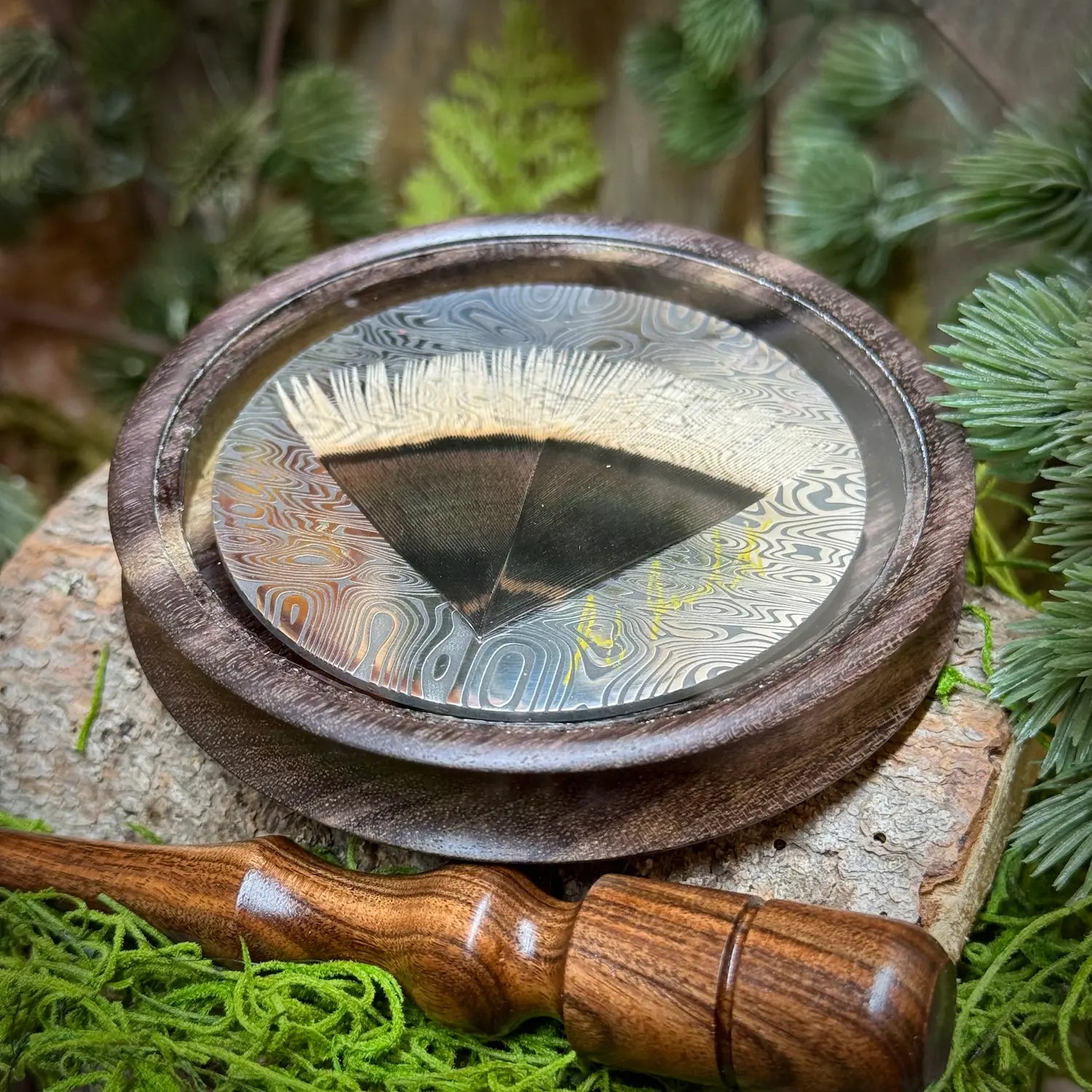 Blue Mahoe Turkey Pot Call with glass surface over Merriam's Feather and Damascus engraved aluminum soundboard.
