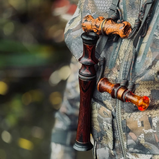 Cocobolo Goose Flute on lanyard at chest of waterfowl hunter