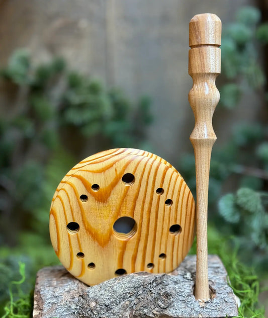 Heart Pine Turkey Call displayed next to lighter toned Black Locust Wood striker