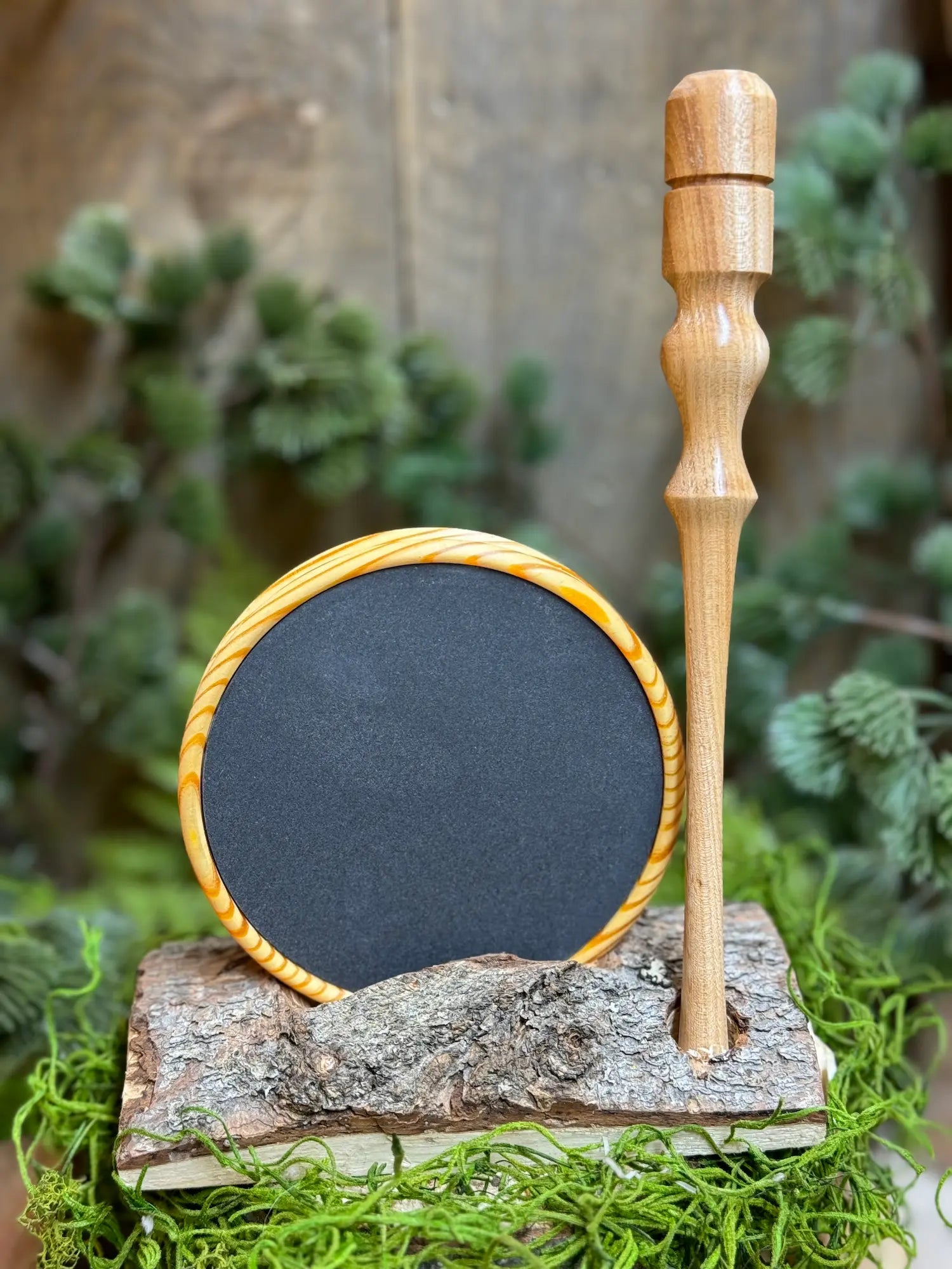 Heart Pine Turkey Call with gray slate surface displayed next to lighter toned Black Locust Wood striker 