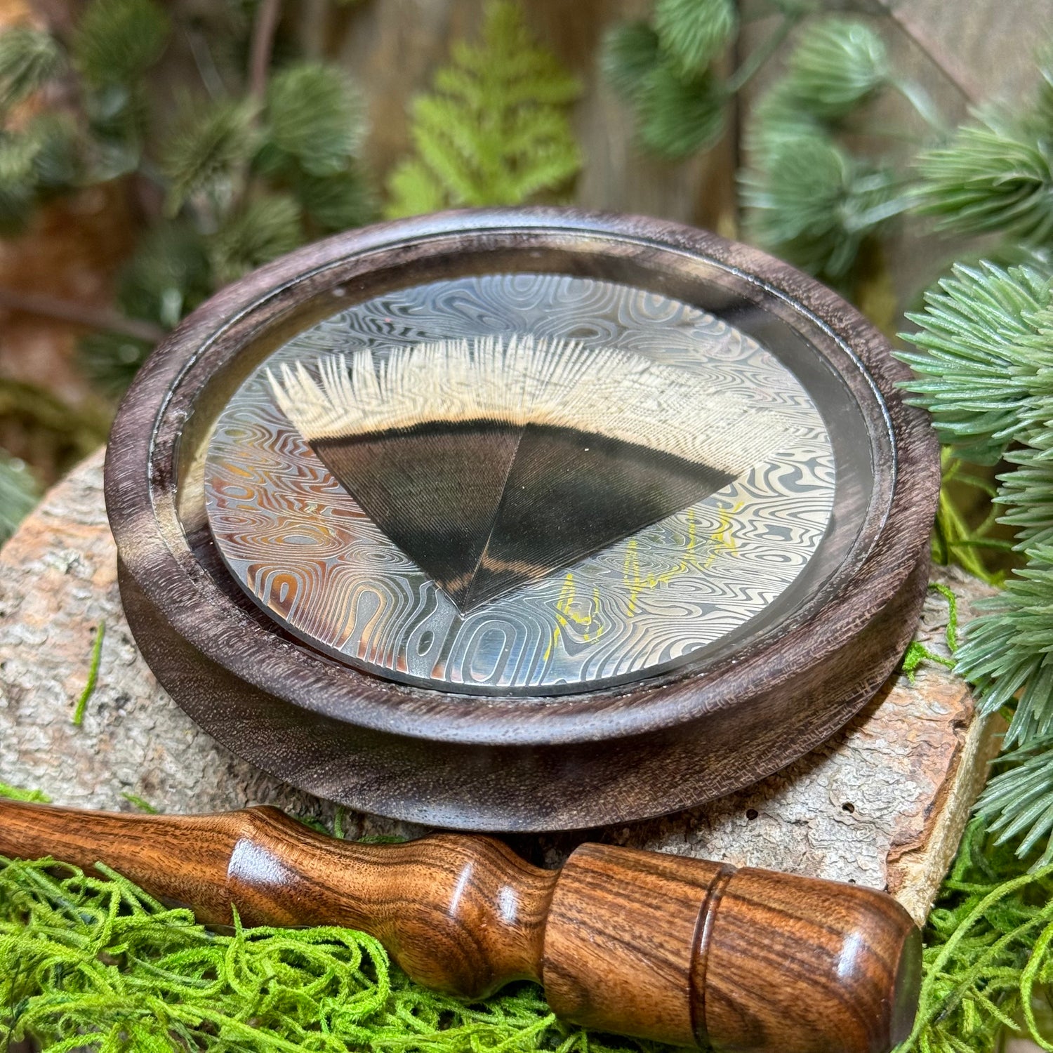 Blue Mahoe Pot Call with Merriam's Feather under Glass. Features Damascus Engraved Aluminum Soundboard