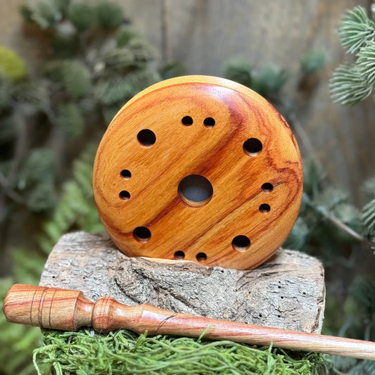 Tulipwood Turkey Pot Call next to a matching tulipwood striker
