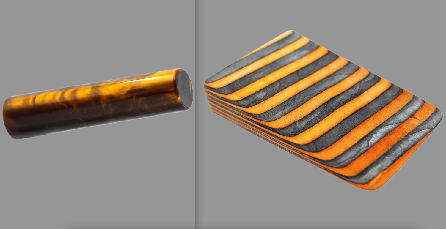 swatch of swirling copper tone acrylic rod next to Wildfire laminate wood pattern of alternating ash silver and neon orange tones set off by black dividing lines