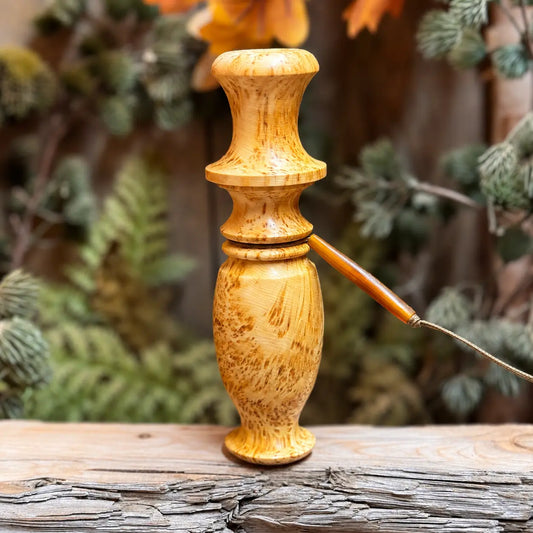 golden tone Yellow Cedar Burl compact grunt for blacktail or whitetail with buffalo horn bead on lanyard