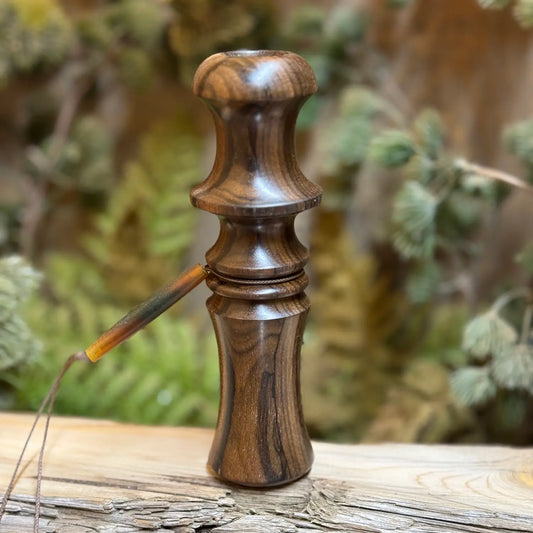 Handcrafted ziricote wood owl hooter with rich dark olive wood grain. This exquisite turkey locator call has a compact design with a custom lanyard. 
